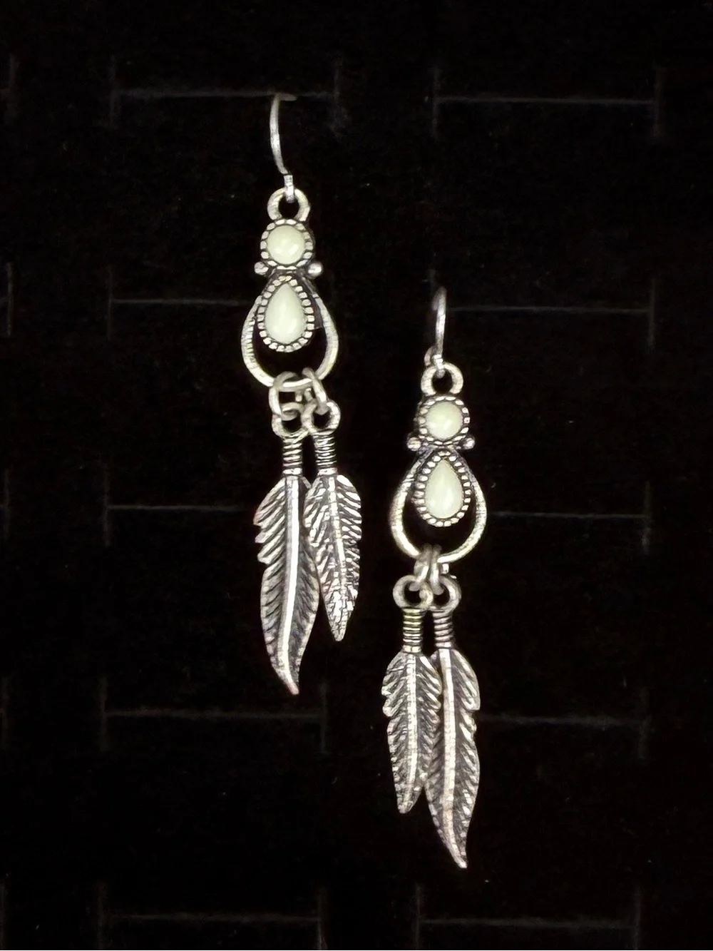 Silvertone white leaf fringe pierced dangle earrings